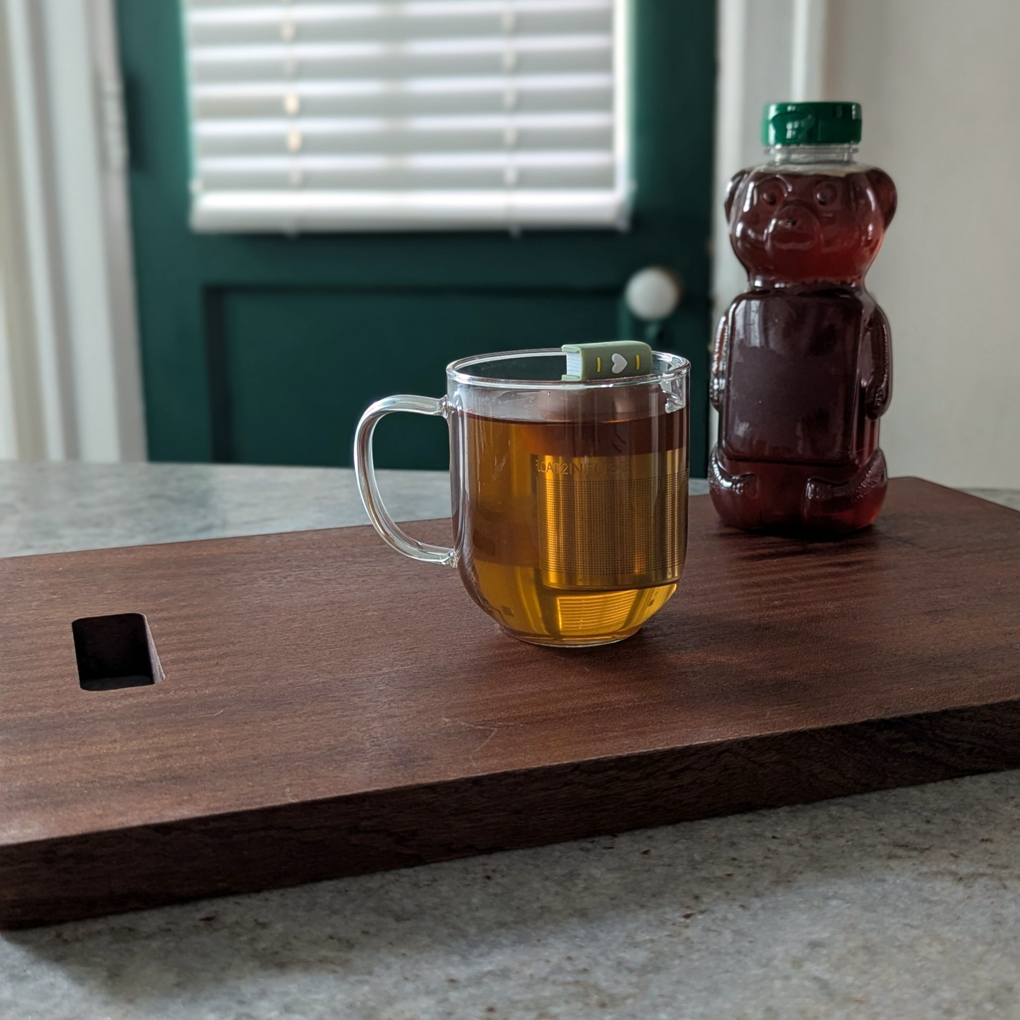 Green Heart Book | Floating Tea Infuser | Light Brown Base